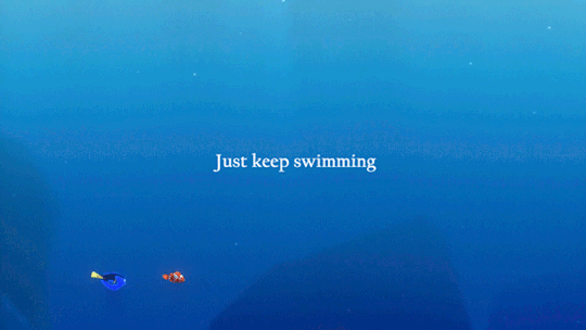 a quote to inspire you, picturing Dory and Nemo, fishes from the movie Finding Nemo, in the ocean and the quote "just keep swimming".